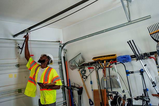 Professional Garage Door Panel Replacement technician working in West Canton, NC